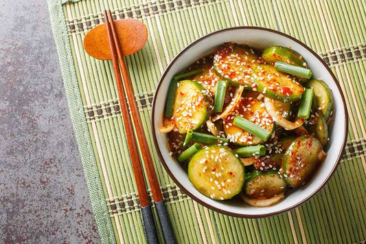 Easy Spicy Korean Cucumber Salad Oi Muchim made with garlic, onion, sesame and hot peppers