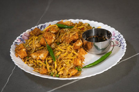 Spicy Chicken Hakka Noodles with Crispy Fried Chicken